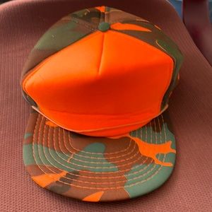 Speedway orange and green camo trucker hat, new w/o tags. One size fits all